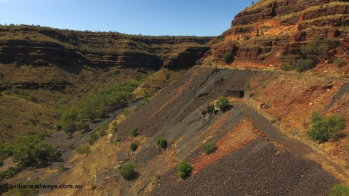 160103 DJI 0055
Colonial Mill and mine ruins located within Wittenoom Gorge. Concrete foundations remain of the once impressive crusher, mill, dryer and bagging plant. See images of the site intact [url=http://www.pilbararailways.com.au/gallery/thumbnails.php?album=118] here [/url]. Geodata: [url=https://goo.gl/maps/SjAFSM93y4q] -22.3107554 118.3185943 [/url].

