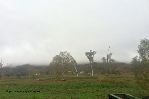 160708 iPh5S 2784
Wittenoom, view looking south at the fog hanging over Mount Watkins and the Hammersley Range from 53 Fifth Avenue Wittenoom, taken at 3:15pm, 8th of July 2016. [url=https://goo.gl/maps/P5sgAQmsSvzDrdTn8]Geodata[/url].
