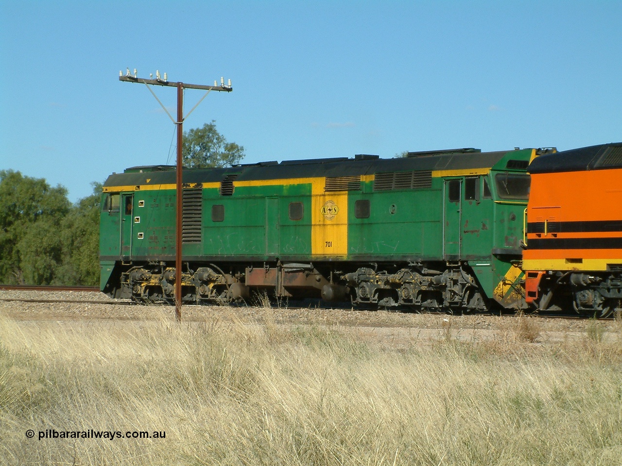 030403 153816
Gladstone, former South Australian Railways AE Goodwin built DL500G ALCo designated the 700 class, class leader 701 serial G6042-2 leads a grain train being loaded on the 3rd April 2003.
Keywords: 700-class;701;G6042-2;AE-Goodwin;ALCo;DL500G;