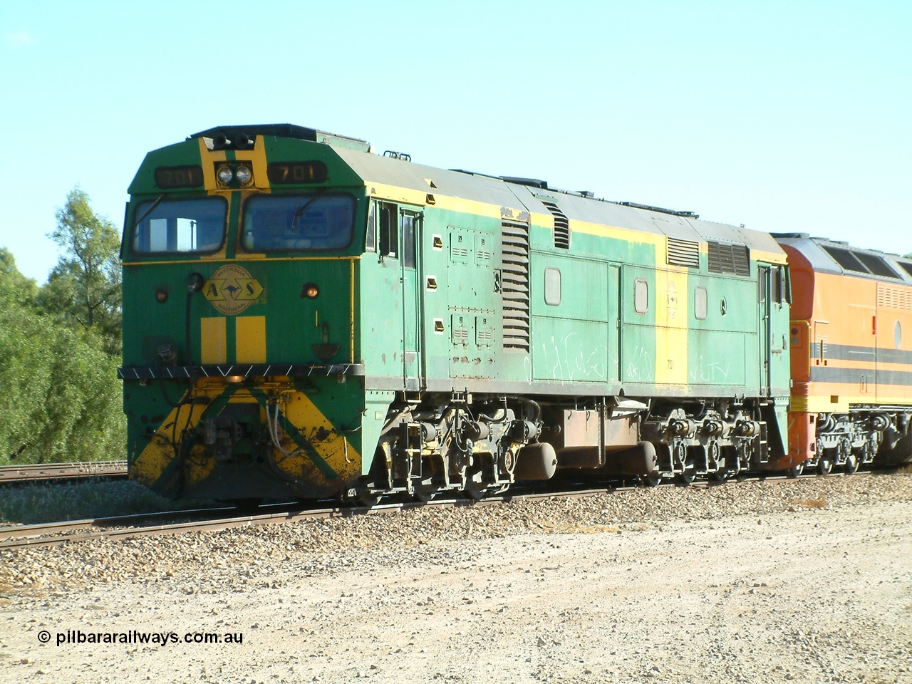 030403 154446
Gladstone, former South Australian Railways AE Goodwin built DL500G ALCo designated the 700 class, class leader 701 serial G6042-2 leads a grain train being loaded on the 3rd April 2003.
Keywords: 700-class;701;AE-Goodwin;ALCo;DL500G;G6042-2;