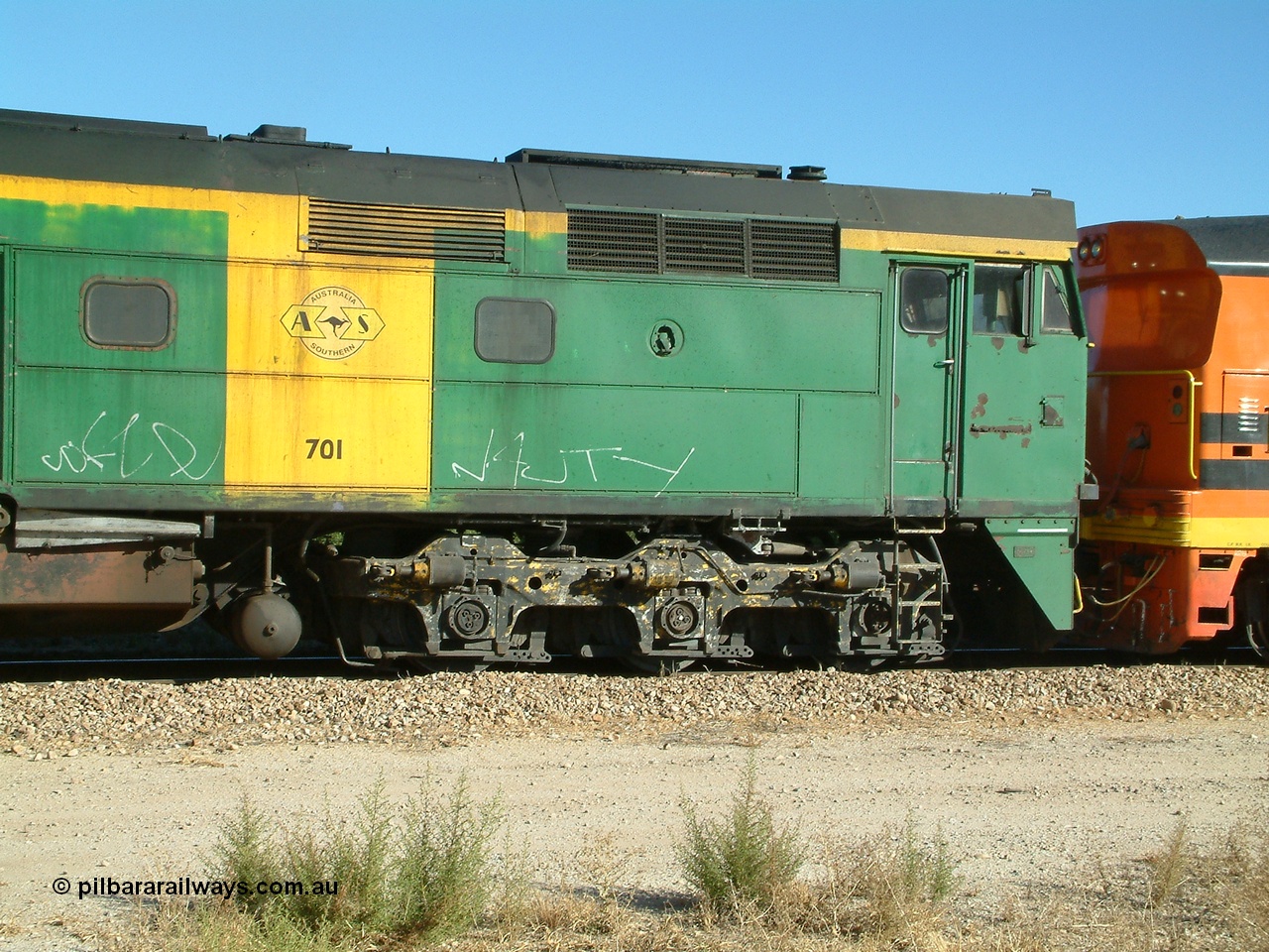 030403 154951
Gladstone, former South Australian Railways AE Goodwin built DL500G ALCo designated the 700 class, class leader 701 serial G6042-2, B end cab side shot, leads a grain train being loaded on the 3rd April 2003.
Keywords: 700-class;701;AE-Goodwin;ALCo;DL500G;G6042-2;