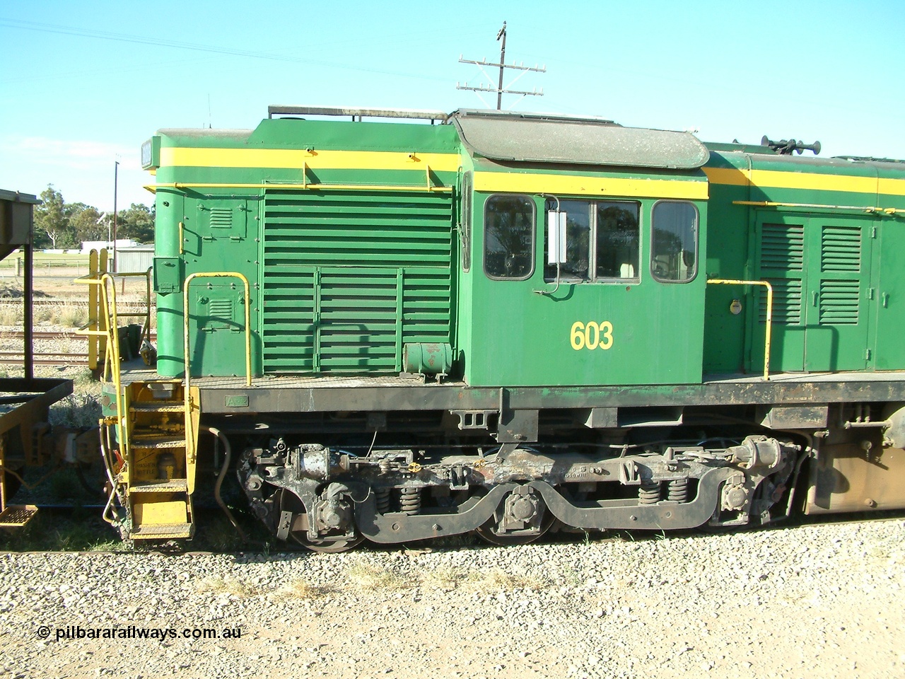 030403 162332
Crystal Brook, cab detail view showing tropical roof and bogie of former Australian National 600 class AE Goodwin built ALCo DL541 model 603 serial G6015-3.
Keywords: 600-class;603;G6015-3;AE-Goodwin;ALCo;DL541;