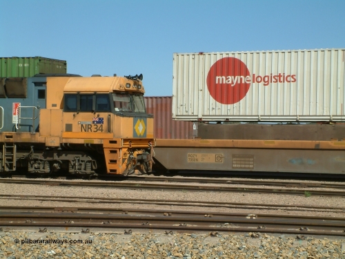 030404 104430
Port Augusta Spencer Junction yard, National Rail Goninan built GE Cv40-9i model NR class unit NR 34 serial 7250-06 / 97-236 sits in the yard in between jobs. 4th April 2003.
Keywords: NR-class;NR34;Goninan;GE;Cv40-9i;7250-06/97-236;