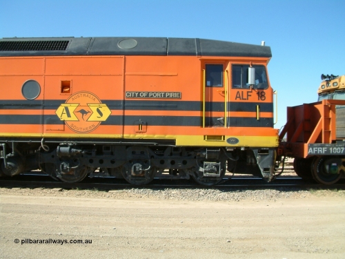 030404 141602
Port Augusta Spencer Junction yard, cab side shot of Morrison Knudsen Australia rebuild unit ALF 18 City of Port Pirie, model JT26C-2M serial 94-AN-018 in Australia Southern livery, originally AL class AL 21.
Keywords: ALF-class;ALF18;MKA;EMD;JT26C-2M;94-AN-018;rebuild;AL-class;AL21;Clyde-Engineering;EMD;JT26C;76-837;