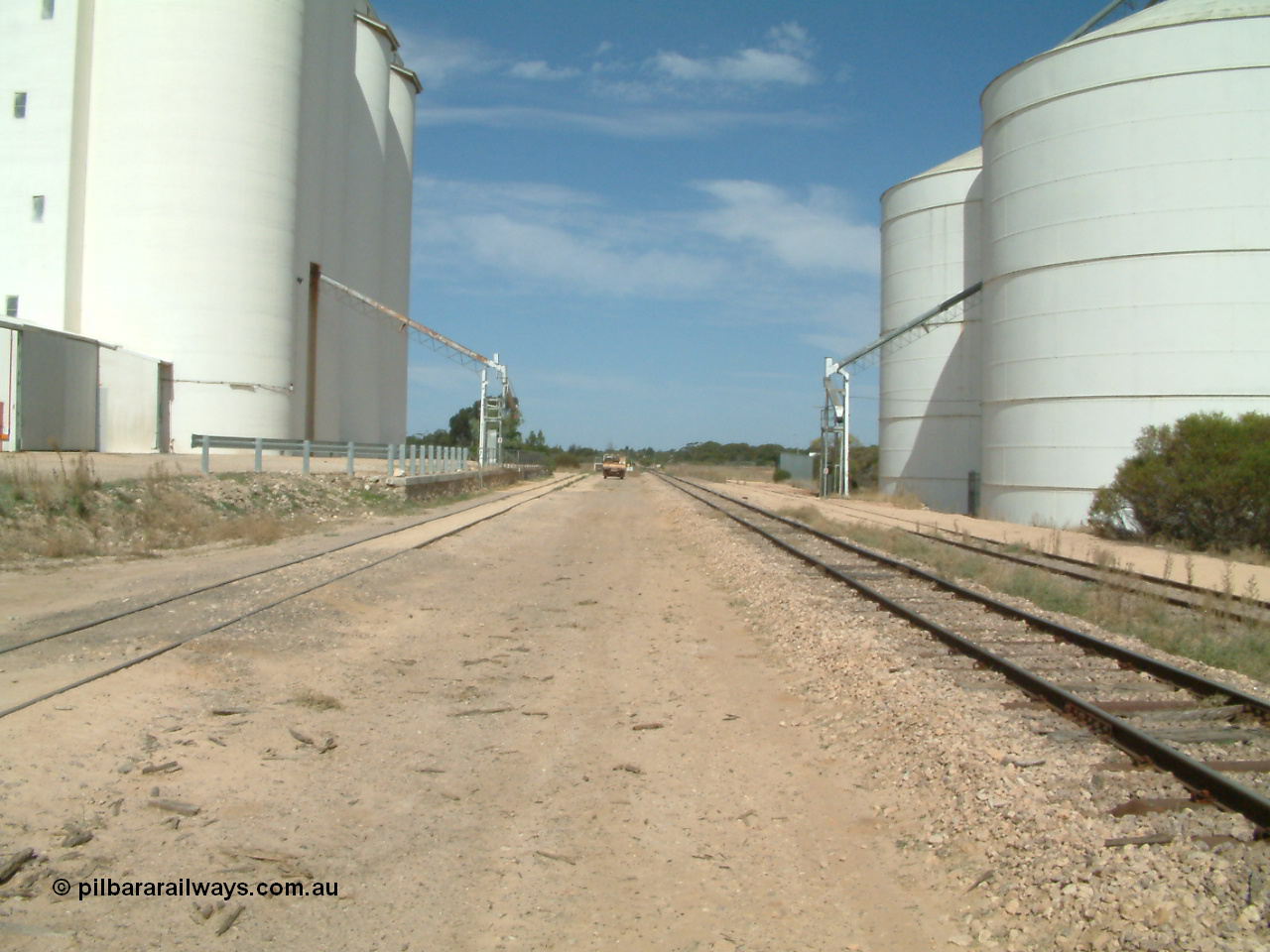 030405 140326
Kyancutta, yard view looking south with both silo complexes and their respective sidings either side of the mainline, looking south, 5th April 2003.
