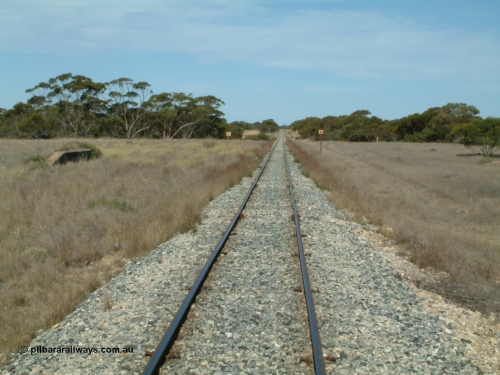 030405 153114
McLachlan, station located at the 156 km, originally opened in September 1914 and called 97 Miles till 1915, closed in August 1972, view looking south with remains of loading ramp at left and square W boards for 'whistle', April 5, 2003.
