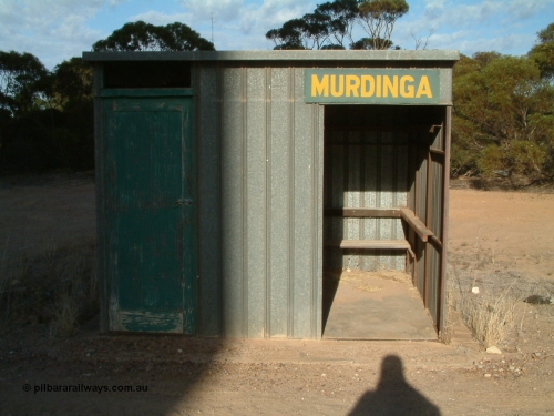 030406 082605
Murdinga, yard view looking south, typical track condition with short bolted rail lengths, grade crossing for Murlong Rd in the distance. 6th April 2003.
