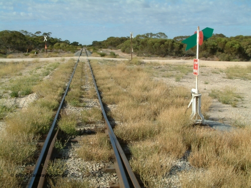 030406 084652
Tooligie, track view looking south from the south end points of yard, point lever and indicator, Tooligie Rd grade crossing, 6th April 2003.
