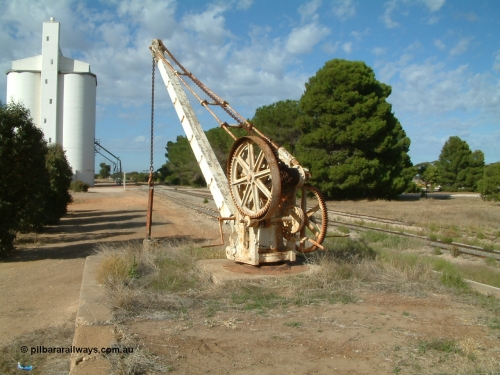 030406 091716
Yeelanna, close up of the 5 ton jib crane on the goods loading ramp, circa 1936. The triangle north leg originally ran through the gap beside the big trees on the right. 6th April 2003.
