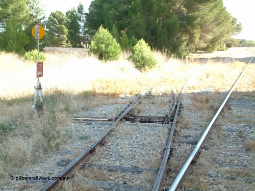 030406 092406
Yeelanna, yard view of the station siding looking north with the points, lever and indicator for the south leg of the triangle and line curving away to the left visible. 6th April 2003.
