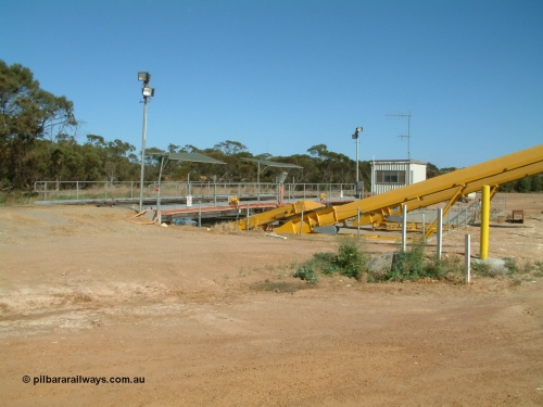 030406 100746
Cummins, grain bunker rail unloading facility with dual DOH 'Drive Over Hopper' and stackers for loading road vehicles. 6th April 2003.
