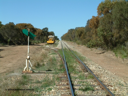 030406 110950
Coomunga, station located at the 21.6 km, opened in November 1907, used these days as a track maintenance siding. Yard overview looking south from the north end points, track machines on the left. 6th April 2003.
