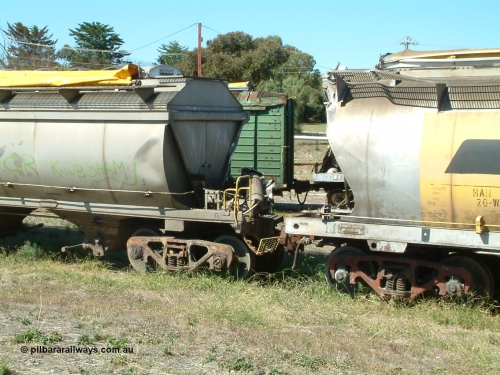 030406 115608
Port Lincoln, derailment damaged SAR Islington Workshops built HAN type bogie wheat waggons HAN 20, non-handbrake end and an unidentified HCN type close up of non-handbrake end damage, stored at the workshops yards. April 6, 2003.
Keywords: HAN-type;HAN20;1969-73/68-20;SAR-Islington-WS;
