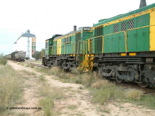 030407 083359
Wudinna, empty grain train shunts back onto train on the mainline, former Australian National Co-Co locomotive AE Goodwin ALCo model DL531 830 class units 851 serial no. 84137 has been on the Eyre Peninsula since delivered in 1962. 7th April, 2003.
Keywords: 830-class;851;AE-Goodwin;ALCo;DL531;84137;