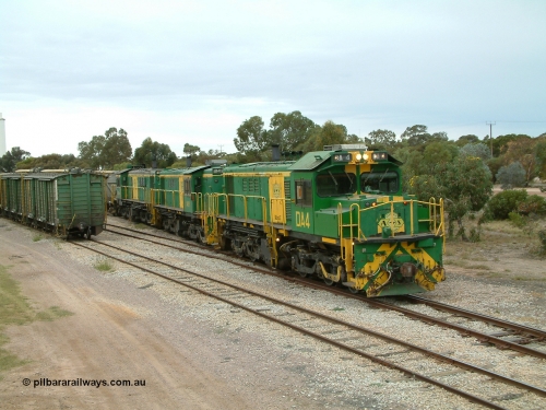 030407 100858
Minnipa, empty grain train shunts back into the grain siding with a trio of former Australian National Co-Co locomotives with rebuilt former AE Goodwin ALCo model DL531 830 class ex 839, serial no. 83730, rebuilt by Port Augusta Workshops to DA class, leading two AE Goodwin ALCo model DL531 830 class units 842, serial no. 84140 and 851 serial no. 84137, 851 having been on the Eyre Peninsula since delivered in 1962. April 7, 2003.
Keywords: DA-class;DA4;83730;Port-Augusta-WS;ALCo;DL531G/1;830-class;839;rebuild;
