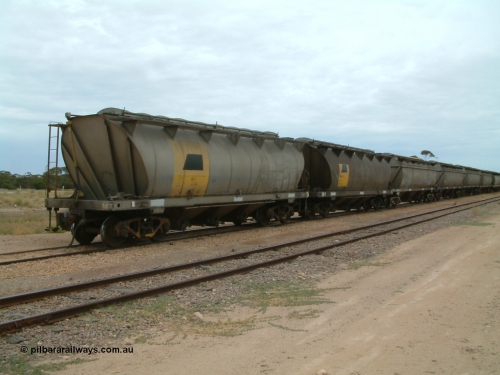 030407 105044
Poochera, loaded SAR Islington Workshops built HAN type bogie wheat waggon HAN 46, at the head of a rake waiting collection. 7th April 2003.
Keywords: HAN-type;HAN46;1969-73/68-46;SAR-Islington-WS;