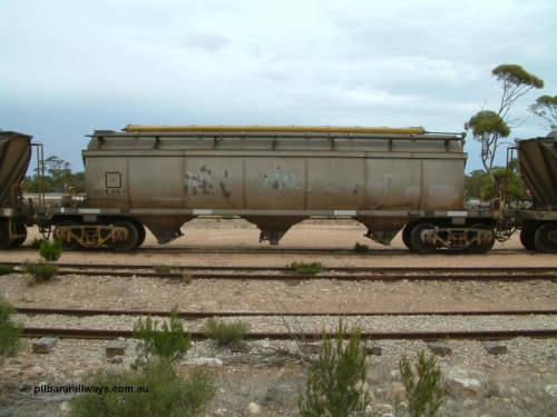 030407 105517
Poochera, track view and side view of HCN type bogie wheat waggon HCN 36, modified at Islington Workshops in 1978-80 which started life as a Tulloch built NHB type iron ore hopper for the CR on the North Australia Railway in 1968-69, showing the roll top covers. 7th April 2003.
Keywords: HCN-type;HCN36;SAR-Islington-WS;rebuild;Tulloch-Ltd-NSW;NHB-type;NHB1592;