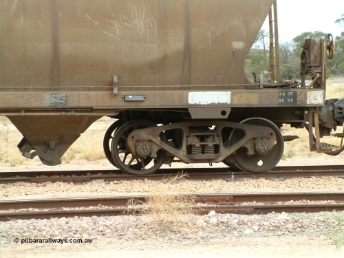 030407 105647
Poochera, detail view of the bogie with spoked axle set on loaded SAR Islington Workshops built HAN type bogie wheat waggon HAN 3, also note handbrake detail. 7th April 2003.
Keywords: HAN-type;HAN3;1969-73/68-3;SAR-Islington-WS;