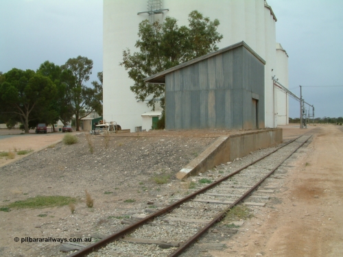 030407 105741
Poochera goods shed and loading ramp in front of the concrete silo complex.
