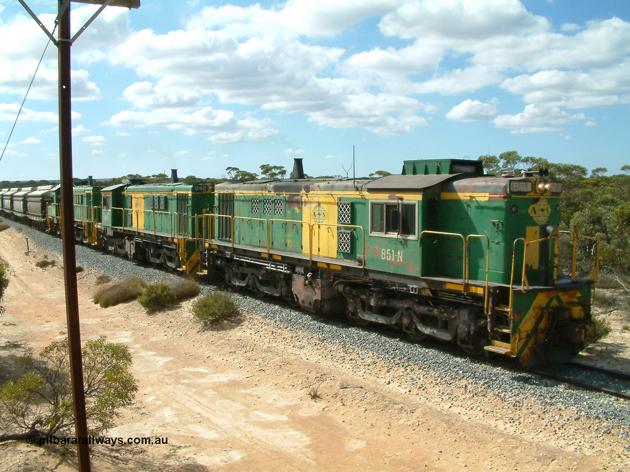 030409 110610
Caralue, loaded grain train working south of the former station site 830 class unit 851 AE Goodwin ALCo model DL531 serial 84137, 851 has spent its entire operating career on the Eyre Peninsula, it leads fellow 830 class 842 serial 84140 and a rebuilt unit DA 4, rebuilt from 830 class unit 839 by Port Augusta Workshops, retains original serial 83730 and model DL531 and two XNW grain waggons.
Keywords: 830-class;851;84137;AE-Goodwin;ALCo;DL531;