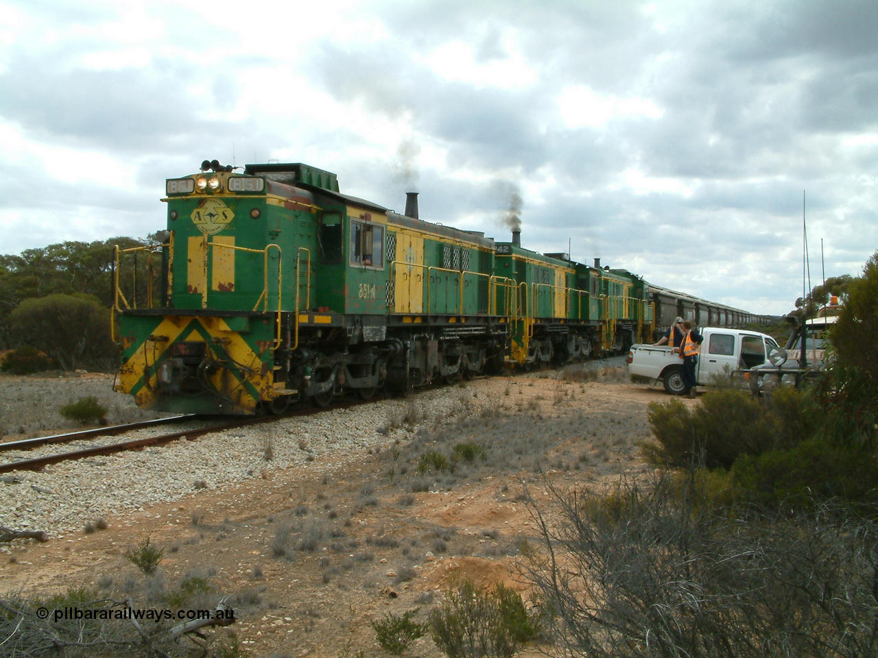 030409 121202
Kielpa, a few kilometres south of the former Konanda siding loaded grain train with 830 class unit 851 AE Goodwin ALCo model DL531 serial 84137, 851 has spent its entire operating career on the Eyre Peninsula, leads fellow 830 class 842 serial 84140 and a rebuilt unit DA 4, rebuilt from 830 class unit 839 by Port Augusta Workshops, retains original serial 83730 and model DL531 with the first twelve waggons behind the locos XNW type powers away from a crew change.
Keywords: 830-class;851;84137;AE-Goodwin;ALCo;DL531;