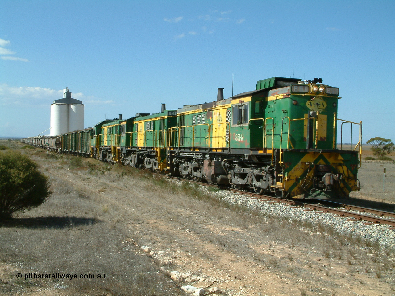 030409 141629
Wharminda, loaded grain train prepares to depart having attached extra loading behind 830 class unit 851 AE Goodwin ALCo model DL531 serial 84137, 851 has spent its entire operating career on the Eyre Peninsula, with fellow 830 class 842 serial 84140 and a rebuilt unit DA 4.
Keywords: 830-class;851;84137;AE-Goodwin;ALCo;DL531;