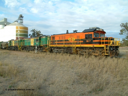 030409 080106
Warramboo, empty grain train arrives just after 0800 and stops for a crew change. Rebuild unit DA 7 in Australian Southern orange and black livery leads a pair of AE Goodwin built ALCo model DL531 830 class units 872 and 871.
Keywords: DA-class;DA7;83713;Port-Augusta-WS;ALCo;DL531G/1;48-class;4813;rebuild;