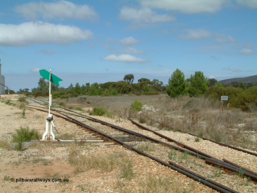 030409 111927
Darke Peake, yard overview looking at the north leg of the triangle curve away to the west, 199 km post, points and lever for the goods and grain siding.
