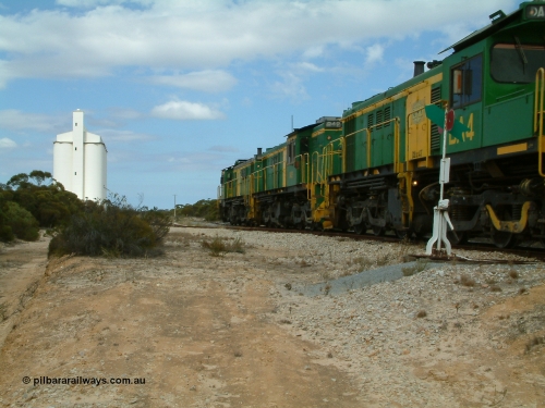 030409 122744
Kielpa, loaded grain train with 830 class unit 851 AE Goodwin ALCo model DL531 serial 84137, 851 has spent its entire operating career on the Eyre Peninsula, leads fellow 830 class 842 serial 84140 and a rebuilt unit DA 4 rumbles over the north end points heading south.
