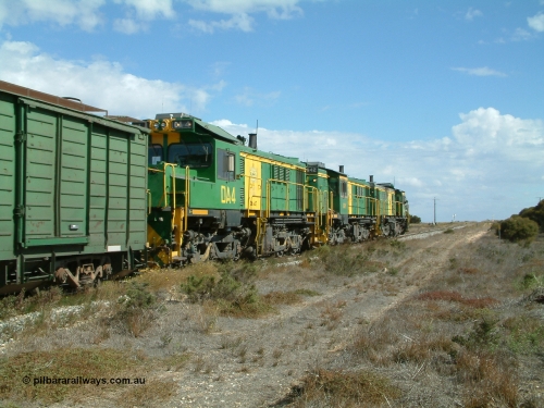 030409 141411
Wharminda, the engines 830 class unit 851 AE Goodwin ALCo model DL531 serial 84137, fellow 830 class 842 serial 84140 and a rebuilt unit DA 4 shunt along the mainline with the loaded waggons.
Keywords: DA-class;DA4;83730;Port-Augusta-WS;ALCo;DL531G/1;830-class;839;rebuild;