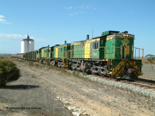 030409 141620
Wharminda, loaded grain train prepares to depart having attached extra loading behind 830 class unit 851 AE Goodwin ALCo model DL531 serial 84137, 851 has spent its entire operating career on the Eyre Peninsula, with fellow 830 class 842 serial 84140 and a rebuilt unit DA 4.
Keywords: 830-class;851;AE-Goodwin;ALCo;DL531;84137;