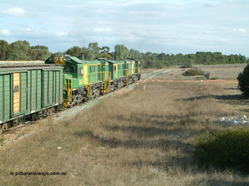 030409 152433
Ungarra, the peace is shattered as a loaded grain train storms upgrade through the station behind 830 class unit 851 AE Goodwin ALCo model DL531 serial 84137, fellow 830 class 842 serial 84140 and a rebuilt DA class unit DA 4 trailing view as the continue south.
Keywords: DA-class;DA4;83730;Port-Augusta-WS;ALCo;DL531G/1;830-class;839;rebuild;