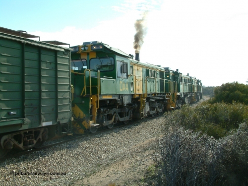 030409 153952
Moody Tank, a loaded grain train storms around the curve behind 830 class unit 851 AE Goodwin ALCo model DL531 serial 84137, fellow 830 class 842 serial 84140 and a rebuilt DA class unit DA 4, trailing view.
Keywords: DA-class;DA4;83730;Port-Augusta-WS;ALCo;DL531G/1;830-class;839;rebuild;