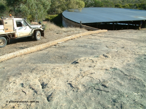030409 155222
Moody Tank, view of the catchment wall directing the water run off into the tank.
