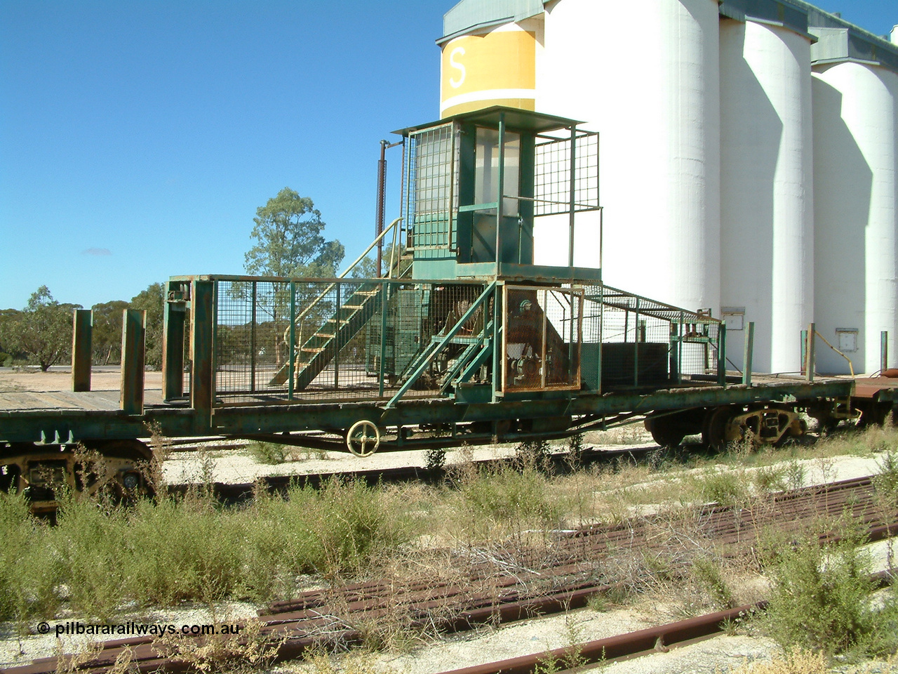 030411 110227
Kimba, rail recovery winch waggon EZWL 2, shows cabin mounted above motor and winch, built using underframe of broad gauge horse box BH 4331. To Eyre Peninsula 1992, recoded then from AZWL. Scrapped in 2005.
Keywords: EZWL-type;EZWL2;SAR-Islington-WS;BH-type;BH4331;