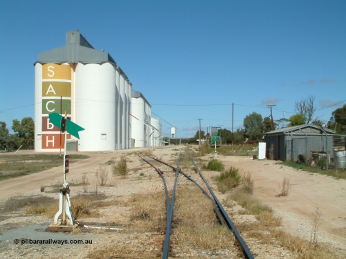 030411 105754
Kimba, station yard view looking south from Kimba Terrace, gang shed on the right, winch waggon visible and silos on the left.
