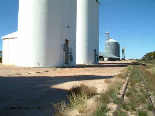 030411 141503
Nunjikompita, yard view looking east, concrete silo block 2, then 1, then a horizontal bunker then an Ascom style silo with loadout spout and silo.

