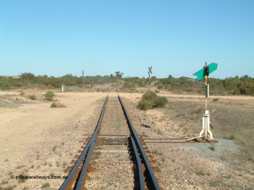 030411 160716
Cungena, looking south at Port Lincoln end of yard across stop sign protected grade crossing for Dickson Drive.

