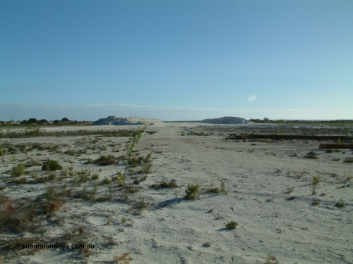 030414 163840
Kevin, , view looking west from inside the triangle at the west leg with gypsum stockpiles either side.
