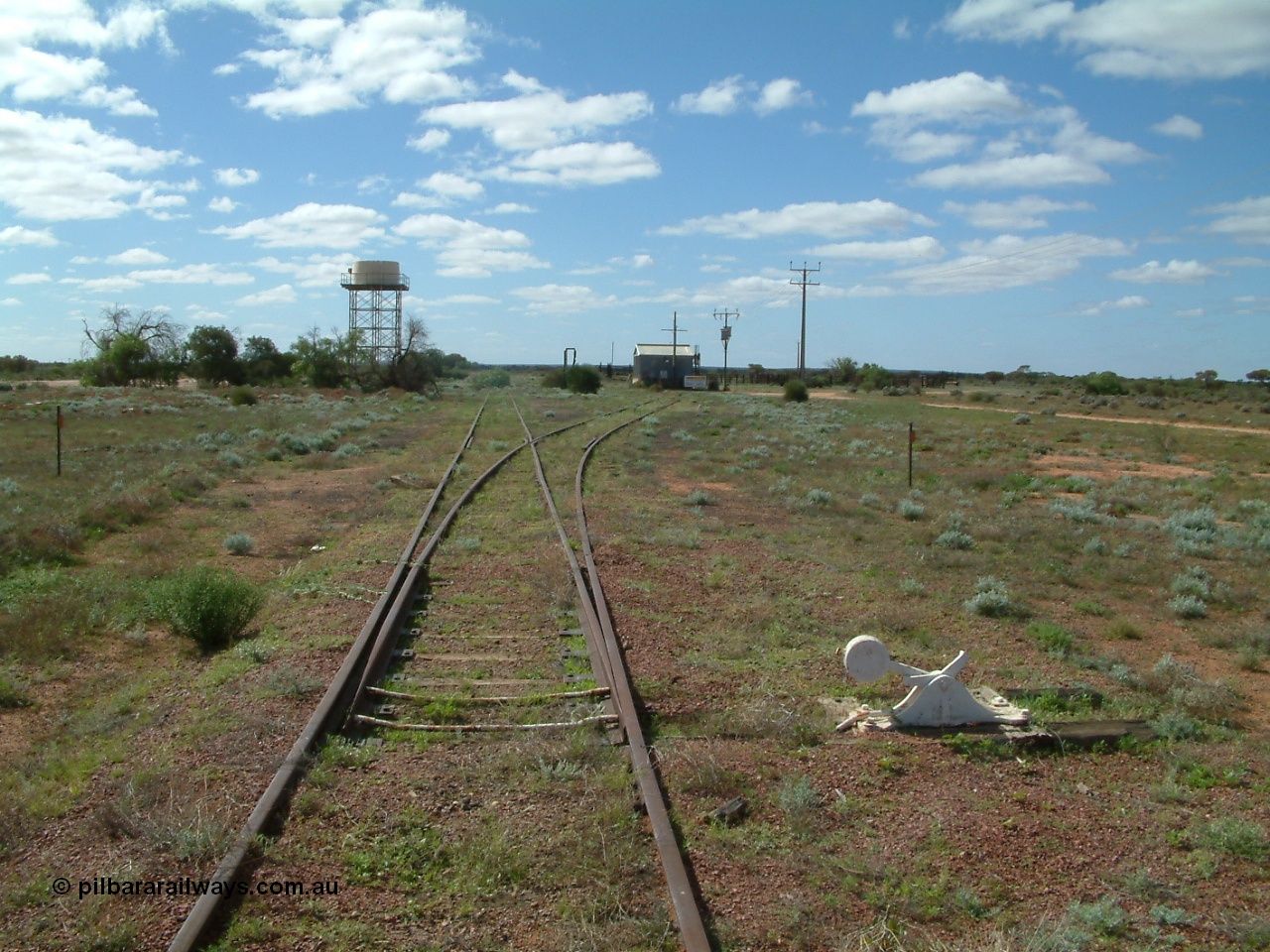 030415 140845
Kingoonya, located at the 426.5 km on the Trans Australian Railway, looking north at the sidings, power station with cattle yards on the right. [url=https://goo.gl/maps/iLo7mK7itLUcZUsp8]GeoData location[/url].
