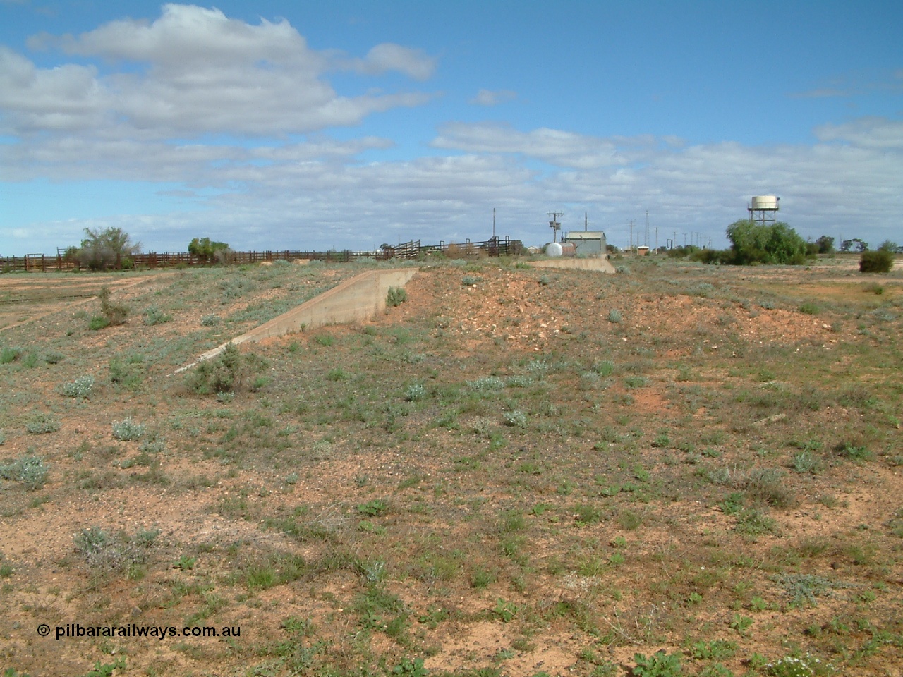 030415 141326
Kingoonya, located at the 426.5 km on the Trans Australian Railway, looking south with loading ramp, cattle yards and loading race, power station, standpipe and tanks stand. [url=https://goo.gl/maps/Tr6FpBMGRyvmQPcXA]GeoData location[/url].
