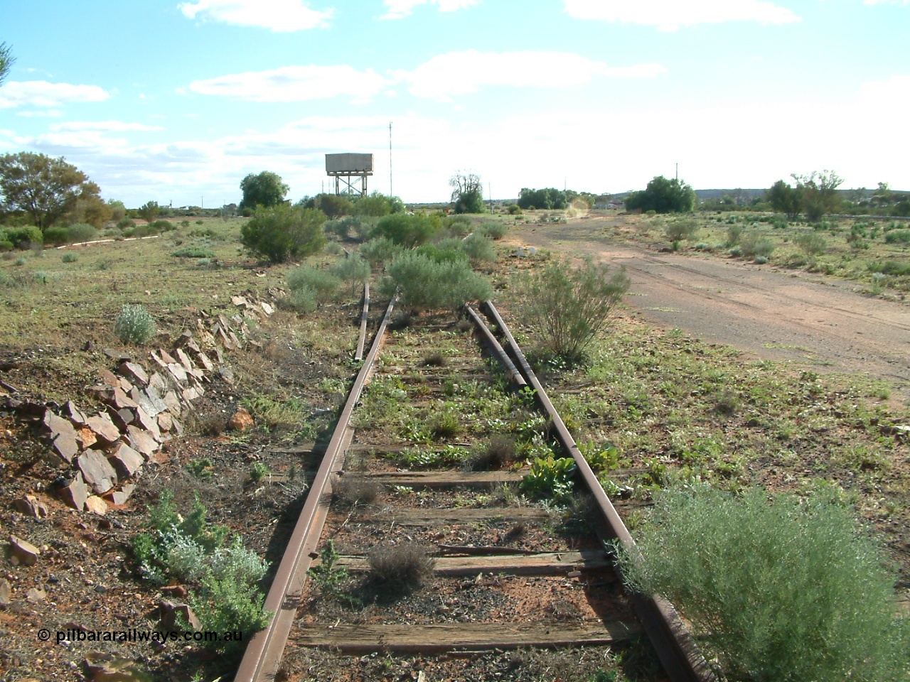 030415 155301
Tarcoola, at the 504.5 km, looking west, removed points for No. 1 Water Road joining the Camp Train Road. Town is to the far north west, and the mainline is on the right. [url=https://goo.gl/maps/hwYG6SvtzrBQZfSMA]GeoData location[/url]. 15th April 2003.
