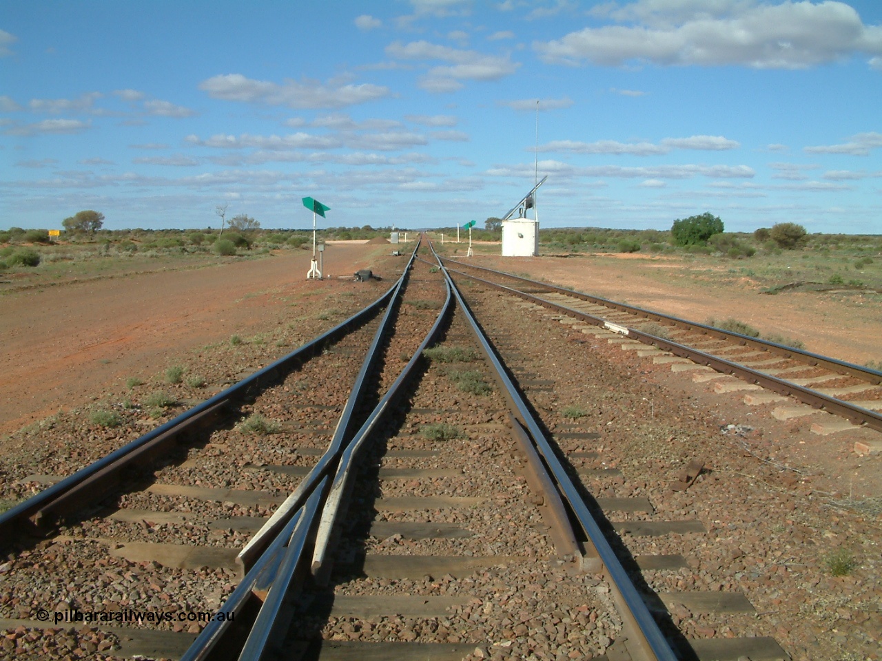 030415 155423
Tarcoola, looking east along the mainline towards Port Augusta, Central Australian Railway coming in from the left, Trans Australian Railway is the middle road with the loop on the right. Tarcoola is the junction for the TAR and CAR railways situated 504.5 km from the 0 km datum at Coonamia outside of Port Pirie. [url=https://goo.gl/maps/bJyV81LpHFFg7PGs7]GeoData location[/url]. 15th April 2003.
