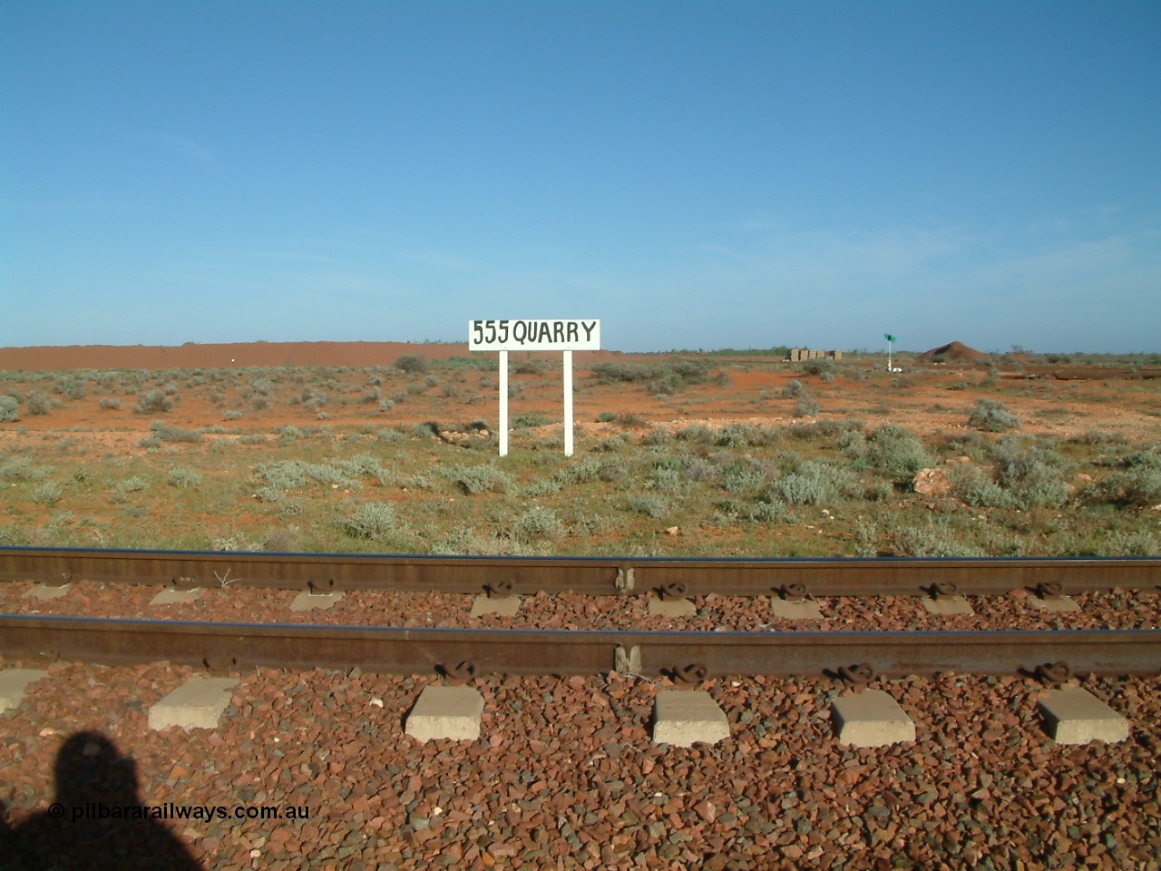 030416 082046
555 Quarry, which is located at the 554.8 km from the 0 km datum from Coonamia or just 50 km from Tarcoola. Looking west across the mainline, siding can be seen on the right. Siding nameboard. [url=https://goo.gl/maps/8L1dSkj8dde4Tk5Q6]GeoData location[/url]. 16th April 2003.
