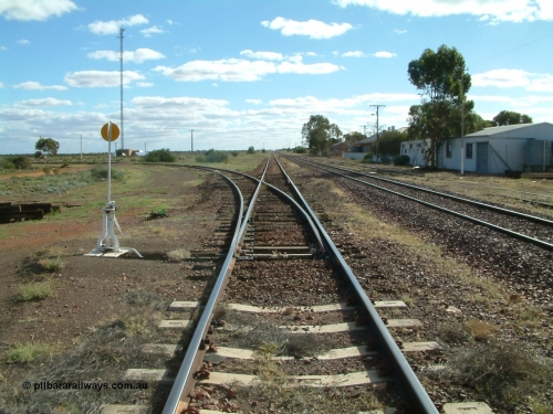 030415 154528
Tarcoola, at the 504.5 km, looking west along loop line, the eastern leg of the triangle running to the left, middle road is the Trans Australian Railway line while the right is the Central Australian Railway line. Tarcoola is the junction for the TAR and CAR railways situated 504 km from the 0 km datum at Coonamia. [url=https://goo.gl/maps/NmBNmrosE7e6d5gx8]GeoData location[/url]. 15th April 2003.
