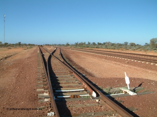 030416 083850
Carnes Siding located at the 566.4 km on the Central Australian line from Tarcoola to Alice Springs. Looking south from the goods siding off the loop with dead-end siding to loading ramp, communications tower at left. [url=https://goo.gl/maps/SFbQb2qfyMiVfcXq7]GeoData location[/url]. 1April 6, 2003.

