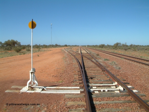 030416 095258
Wirrida Siding, looking south towards Tarcoola with the goods siding and points rejoining the loop, notice the points are on timber sleepers while the loop and mainlines are on concrete, train control 'pillbox' in the distance. Located at the 641 km from the 0 datum at Coonamia and 137 km north of Tarcoola between Carnes and Manguri on the Tarcoola - Alice Springs line. [url=https://goo.gl/maps/kr4tGiBQqpQpopy56]GeoData location[/url]. 1April 6, 2003.
