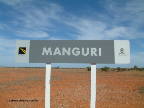 030416 110228
Manguri Siding station nameboard, located 706.5 km from the 0 datum at Coonamia and 200 km north of Tarcoola between Wirrida and Cadney Park on the Tarcoola - Alice Springs line. 1April 6, 2003.
