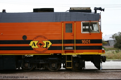 051102 6617
Thevenard, right hand cab side of Clyde Engineering EMD JL22C model unit and class leader 1601, originally NJ 1 serial 71-728, built in 1971 at Clyde's Granville NSW workshops, started out on the Central Australia Railway for the Commonwealth Railways before being transferred to the Eyre Peninsula system in 1981, repainted and renumbered to 1601 in November 2004.
Keywords: 1600-class;1601;Clyde-Engineering-Granville-NSW;EMD;JL22C;71-728;NJ-class;NJ1;