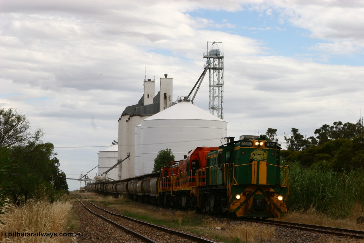 060108 2045
Lock, grain train being loaded by former SAR 830 class unit 842, built by AE Goodwin ALCo model DL531 serial 84140 in 1962, originally on broad gauge, transferred to Eyre Peninsula in October 1987 and, 1204 and sister 851.
Keywords: 830-class;842;84140;AE-Goodwin;ALCo;DL531;